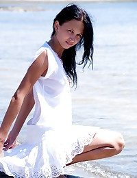 Downcast dour teen posing